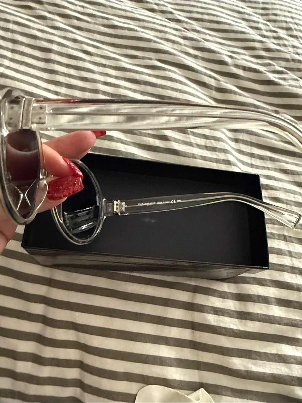 Yves Saint Laurent Clear Frame Black Lens Round Sunglasses
